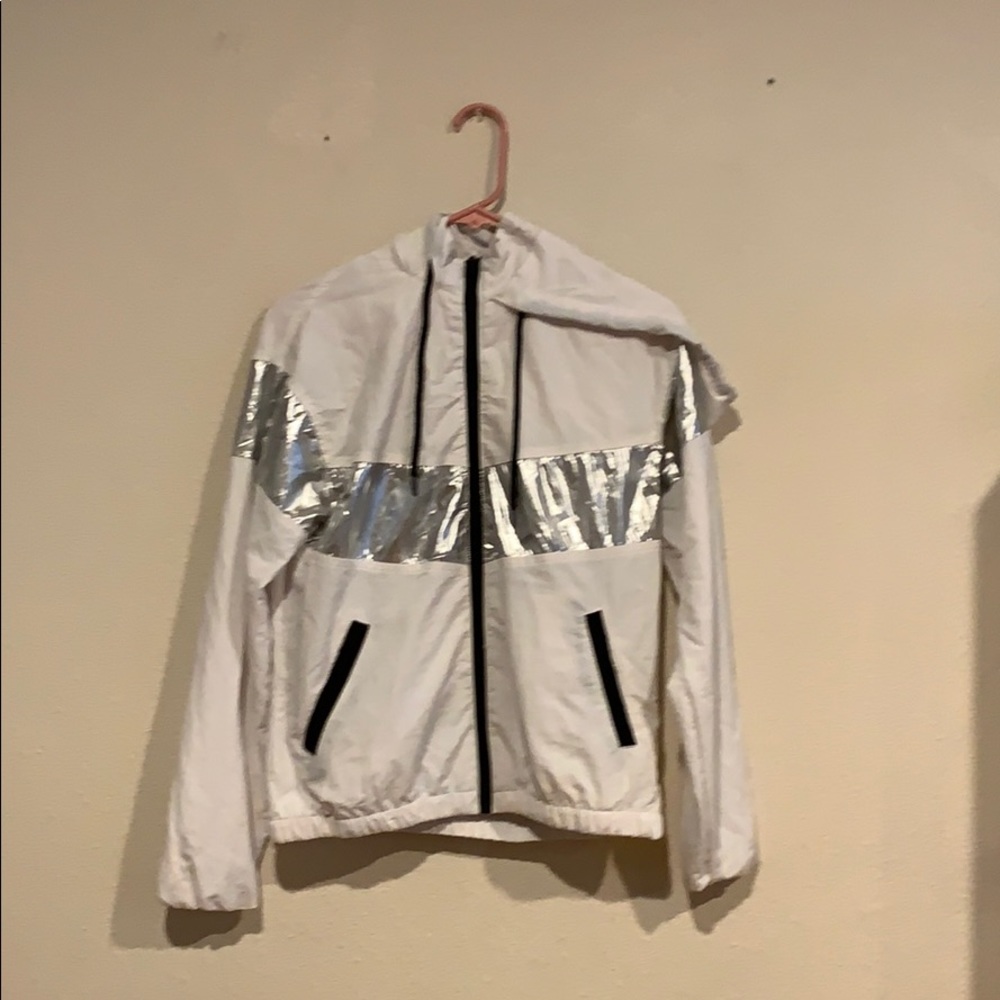 a white windbreaker